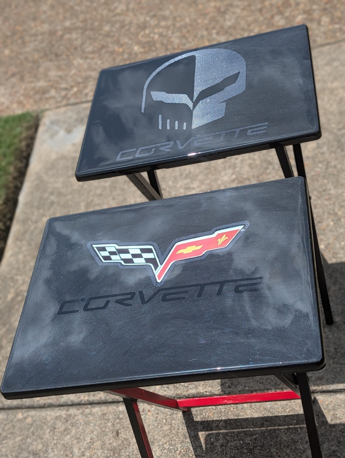 Black custom automotive-themed resin trays