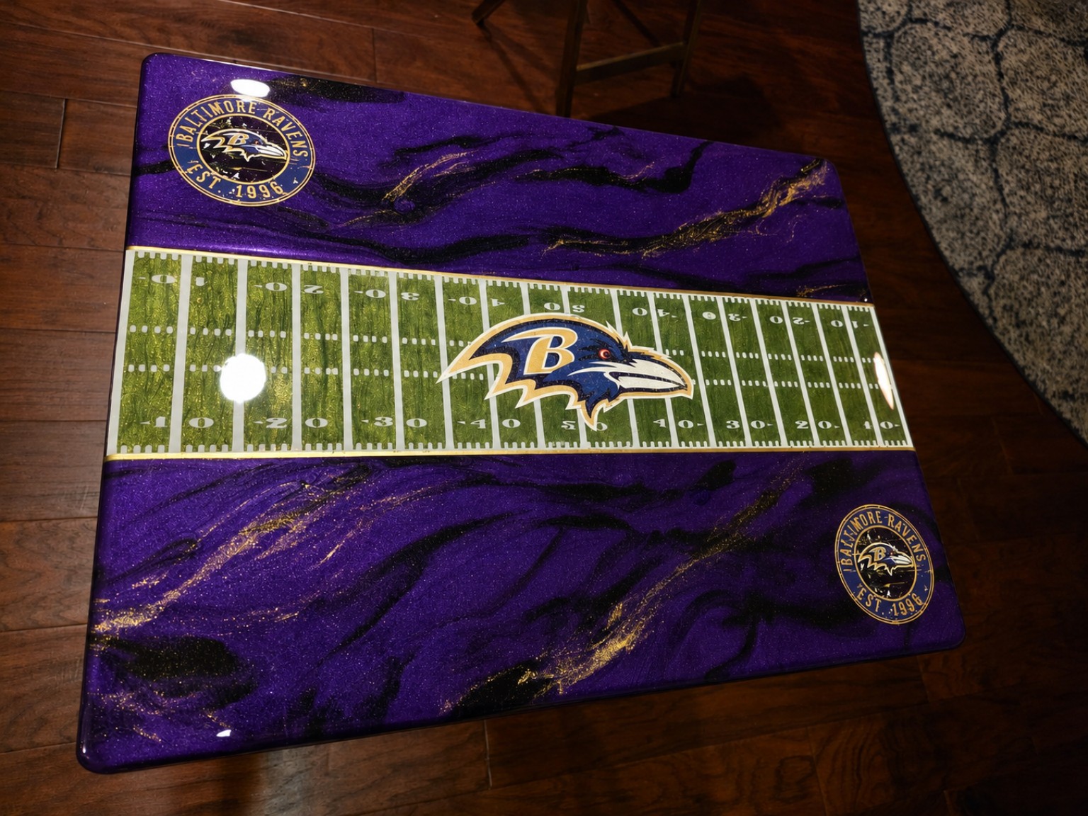 Handcrafted purple and gold sports-themed resin tray